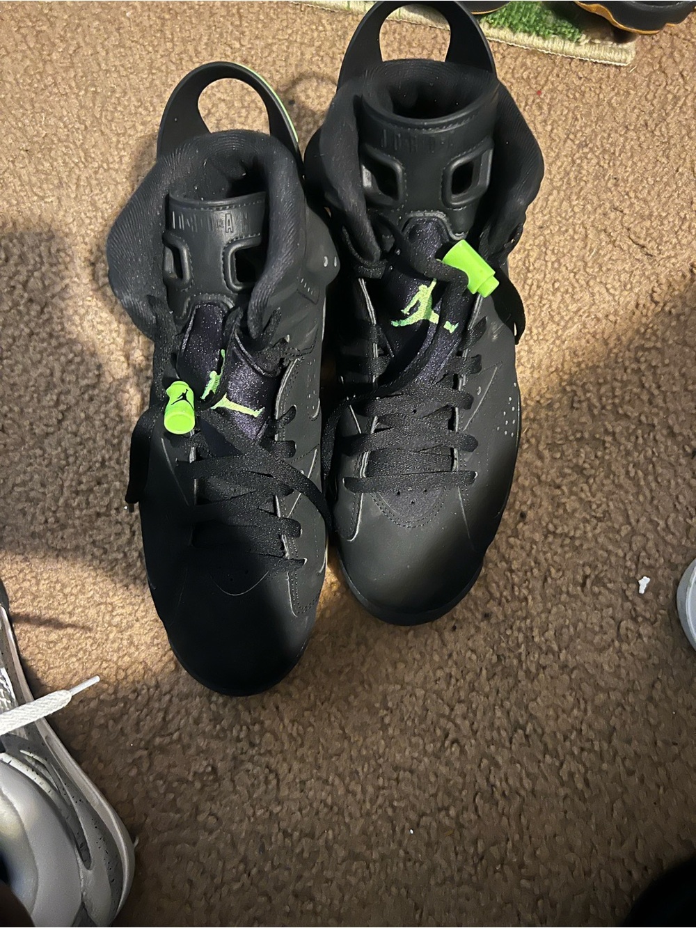 Jordan sneakers in black and neon green